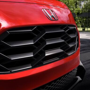 2027 Honda HR-V Sport in Milano Red close up of angular honeycomb grille (Subcompact Crossover SUV).