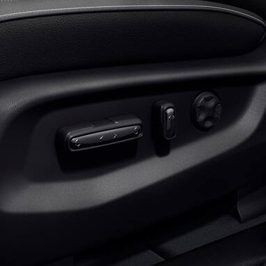Honda Odyssey modern van close up detail of the power seat adjustment controls on the driver seat (Minivan).